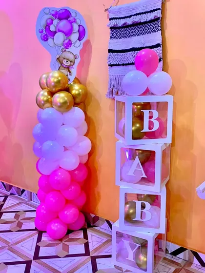 "BABY" blocks filled with pink, white, and gold balloons. This is a versatile decor piece I use for baby showers, naming ceremonies, or first birthdays.
