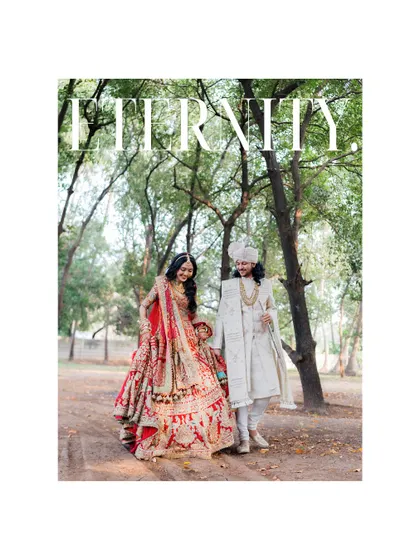 Walking into eternity. This portrait, set against a natural, wooded backdrop, captures the couple and their child, symbolizing the beautiful family they have become.