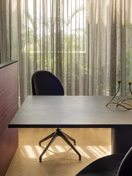 We believe in bringing nature into the workspace. In our own studio, sheer curtains filter the natural light, while indoor plants are placed strategically to create a harmonious relationship between the built environment and the natural world.