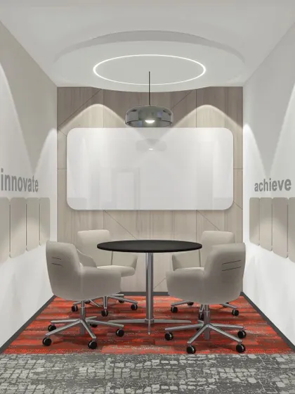 A close-up render of a small meeting or huddle room. The design is simple yet effective, with a whiteboard for brainstorming, sound-absorbing panels, and focused lighting to create a functional space for small groups.