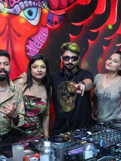 The whole crew together for a picture at the DJ booth.
