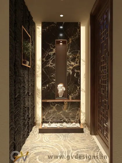 This foyer design uses a dark marble-finish back panel to create a dramatic niche. The space is softened with a textured wall, a simple wooden door with a geometric pattern, and ambient lighting.