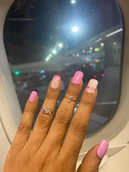 A perfect view from the window seat. These pink nails with minimalist line art are ready for takeoff on the next adventure.
