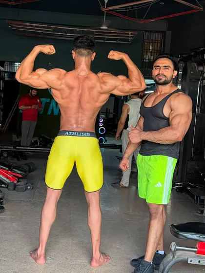 His back is one of his strong points. We've worked hard to build that V-taper.