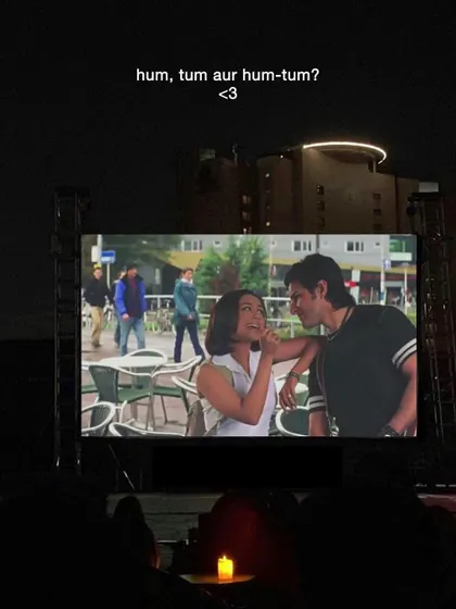 "Hum, tum aur hum-tum?" A perfect candle-lit moment captured during a screening of the classic Bollywood rom-com. It's these moments that make our movie nights special.