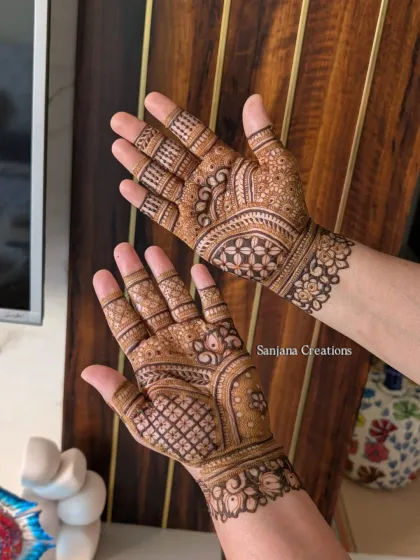 A more intricate design for Karwachauth, combining traditional patterns with floral elements.