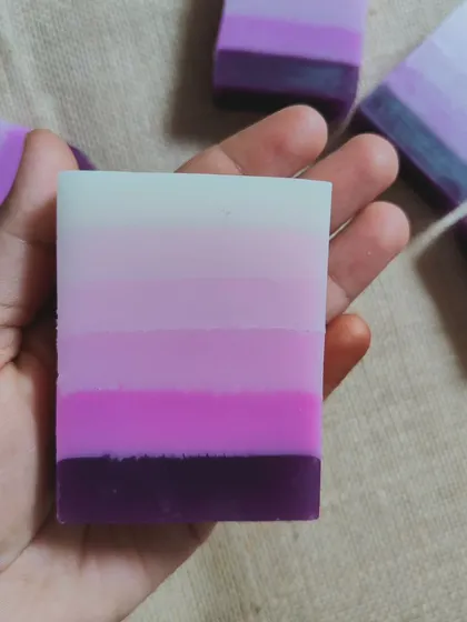 A beautiful layered ombre soap in shades of purple.