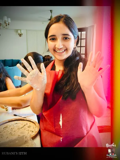 The joy of getting your hands messy. A happy moment from Rubani's 12th birthday party, where everyone got to be an artist for the day.