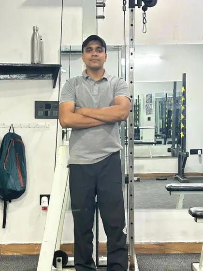 Posing by the cable machine.