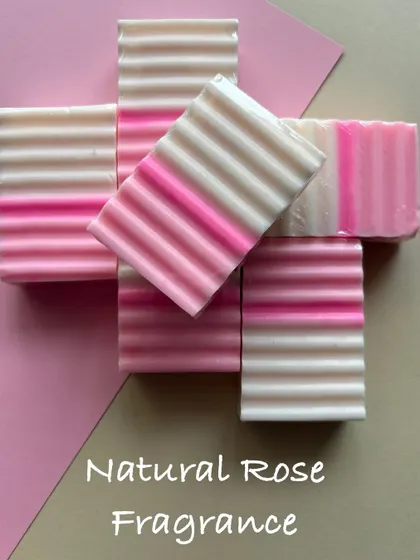 Pretty in pink. These bars have a delicate Natural Rose fragrance and a simple, elegant layered design. They are perfect for anyone who loves floral scents.