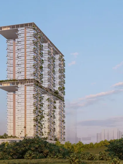 This rendering shows "The Clouds" tower as a vertical green oasis in the city. The design breaks down the mass of the building with large, multi-story open spaces and extensive greenery, creating a healthier and more sustainable model for residential high-rises.
