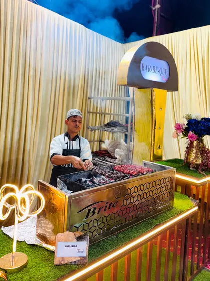 Our custom-branded barbecue station for Khiri Kaleji, complete with stylish neon lighting and elegant decor.