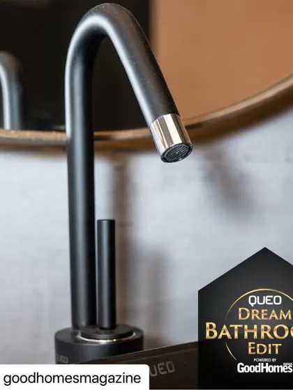 A close-up of the matte black faucet from Queo, a key element in the avant-garde bathroom I designed for the series.