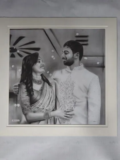 The final piece in a simple white frame.