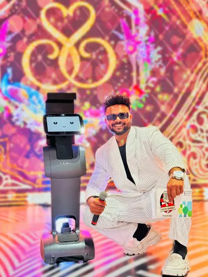 Posing with my robotic co-host. I'm always open to new and innovative ideas to make your event unique.