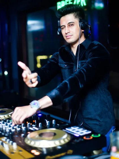 Behind the decks is where my productions come to life. I create custom mashups and remixes so that every set I play has an exclusive flavor, ensuring the energy never drops.