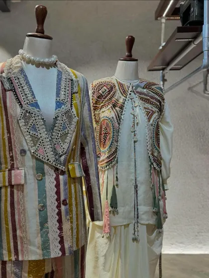Aseem Kapoor's 'Mural' collection is a work of art. This display features a multi-color striped pantsuit and an intricately embroidered vest.