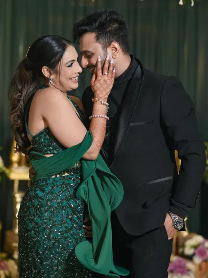 A portrait that captures the deep affection between the couple. The bride's gentle touch on the groom's face and their loving gazes make this a truly romantic and heartfelt image.