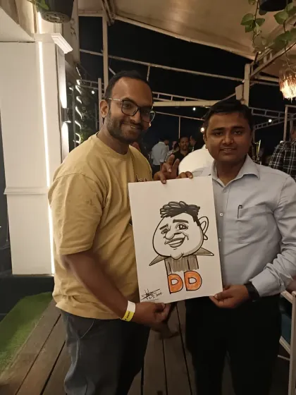 Two friends posing with a caricature. It's a fun, interactive activity for any social gathering.