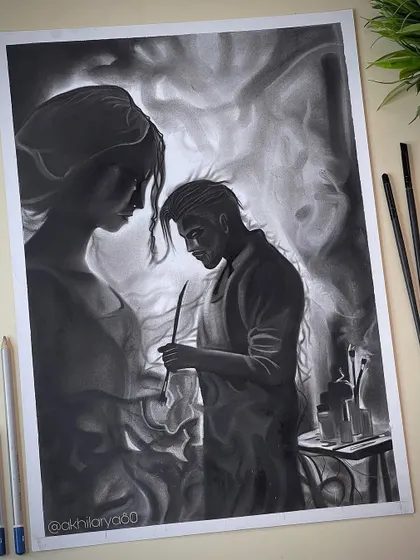 This is the finished artwork from my process video, an imaginary and emotional piece about two souls connected through art. It's a powerful example of what can be created with charcoal on paper.