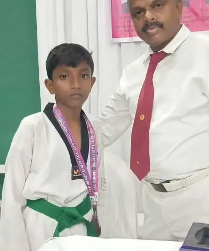 One of my young fighters with his bronze medal from the state championship. Every competition is a learning experience that builds character and strength.