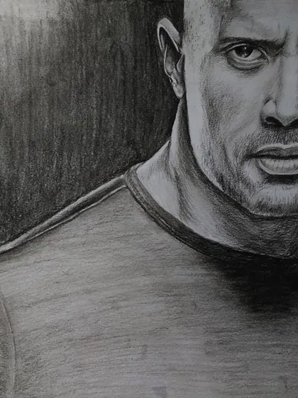 A classic charcoal portrait of Dwayne 'The Rock' Johnson. The focus here was on strong lighting and shadow to define his powerful features and intense stare.