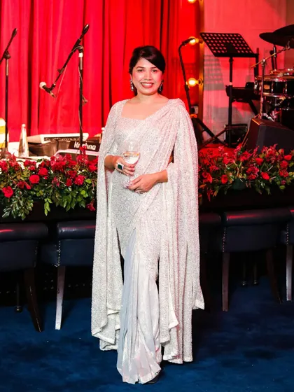 Blending modern style with timeless grace. I designed this custom silver drape saree with dramatic accentuated sleeves for a client who wanted to shine at her cocktail event.