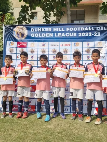 Our young champions with their medals and certificates after the Golden League win. Recognition for their hard work and excellent performance.