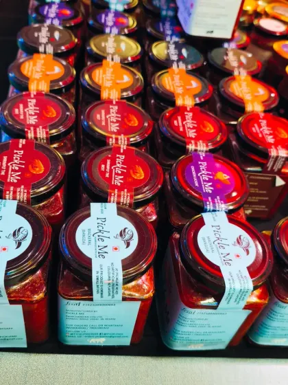 Our stall is always a colourful sight. Here is a look at our non-veg pickles, including the popular squid and prawn varieties, neatly arranged for customers.
