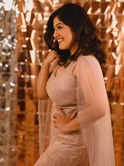 Another elegant pose from the awards night shoot. The makeup looks sophisticated and polished from every angle.