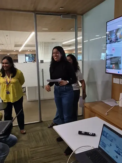Laughter during a team activity at a corporate offsite. I also have experience managing hybrid events, seamlessly engaging with both in-person attendees and those joining via video conference.