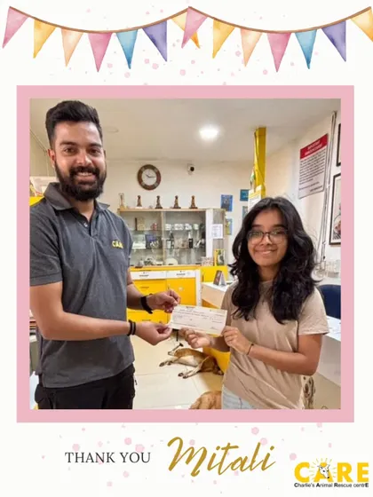 The proud moment when Mitali hands over the cheque from her bake sale fundraiser. Her dedication has made a real financial impact on our ability to care for our animals.