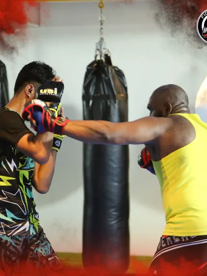 A glimpse of the national team's training. Here, I am working on striking technique with one of the team members, sharing my knowledge to help them prepare.