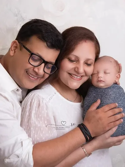 The look of pure love and adoration from new parents. These are the candid, emotional moments I strive to capture, freezing this incredible chapter in your lives.
