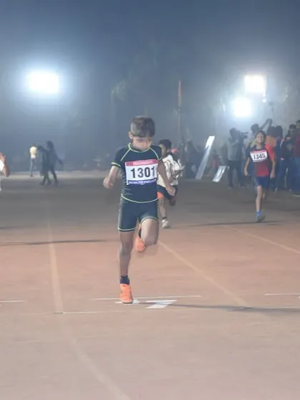 Young athletes give their all at the starting line of a sprint race during TrackNights.