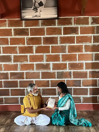 Receiving knowledge from my Guru. He taught me the importance of taking a break to refuel so I can serve my students with more energy and enthusiasm.
