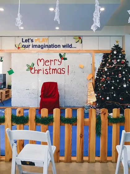 The stage is set for our Christmas performances, complete with a Santa chair and tree.