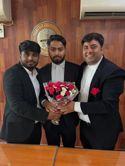 Celebrating a professional milestone together. Teamwork makes the journey in the legal profession more rewarding.