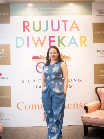 Author Rujuta Diwekar standing proudly in front of the event backdrop for her book launch. It was an honor to capture the campaign shots and the launch event for this milestone.