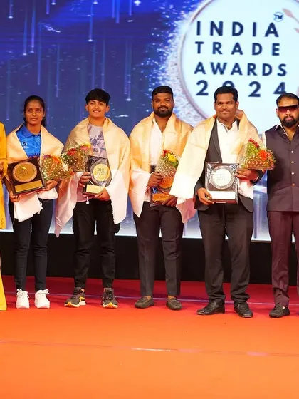 A duplicate of a proud moment on stage at the India Trade Awards.