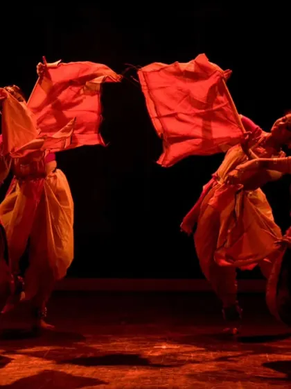 A beautiful shot of my dancers performing with red scarves, creating a dynamic and colourful visual on stage.