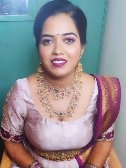 A happy, smiling shot of Manasa. My makeup is designed to be comfortable and long-lasting, so you can enjoy every moment.