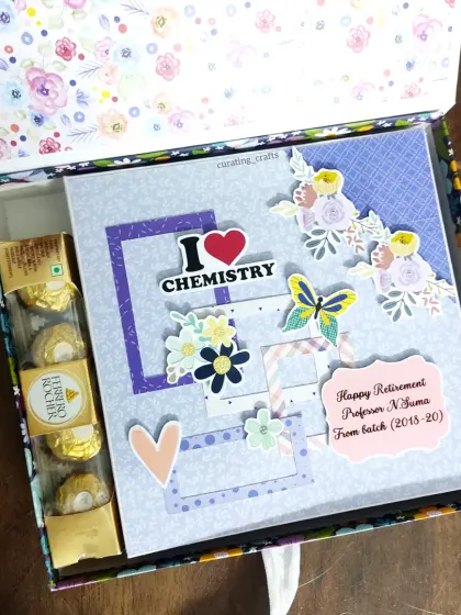 For the retiring chemistry professor, I added a little sleeve of Ferrero Rocher chocolates inside the scrapbook box. It’s a small touch that makes the gift even sweeter.