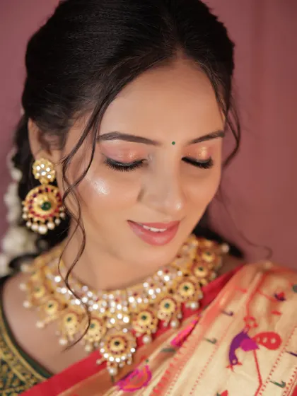 A close-up of the glowing skin and soft eye makeup.