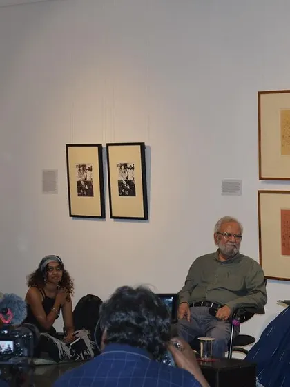 A close-up of Gulammohammed Sheikh and Pushpamala N during their conversation.