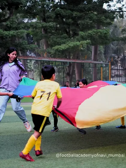 Teamwork makes the dream work, even with a parachute. Fun, collaborative games are a key part of my grassroots program to teach cooperation.