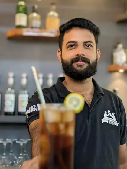 A classic Long Island Iced Tea, a potent and popular choice for any party, expertly made by our team.