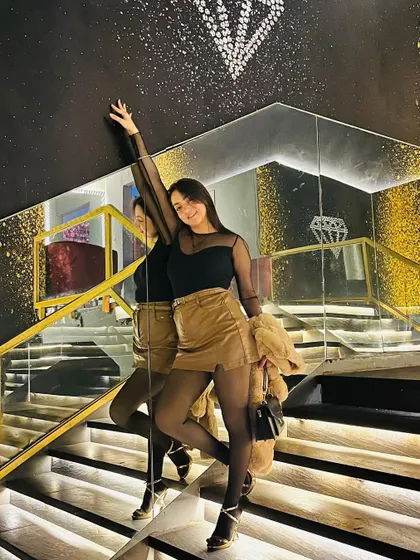 Another great shot from the series, showing how to style a sheer top and skirt for a trendy look.