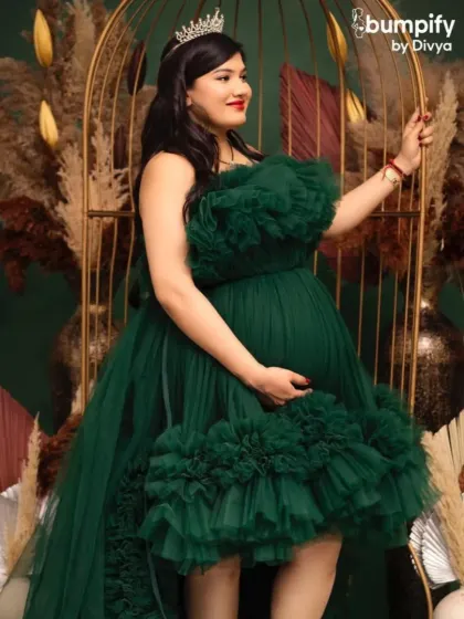 Rule your day in this emerald green high-low tulle gown. Paired with a crown, it’s a look that is both playful and regal.
