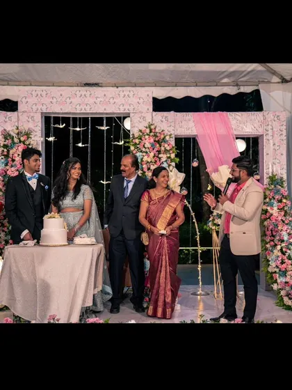Addressing the couple and their parents during a reception. I ensure that family is at the heart of the celebration.